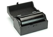 Palmprint ink roll in casing with lid opened.